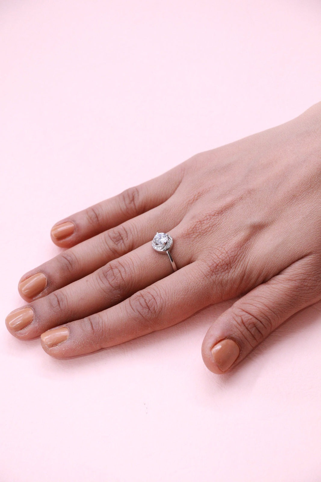 Loveknot Solitare Silver CZ Ring